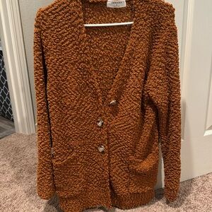 Popcorn cardigan medium but is oversized